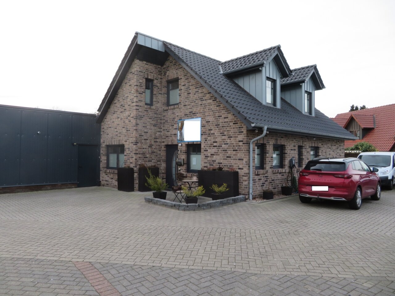 Löningen: Einfamilienhaus mit angebauter Halle Löningen: Einfamilienhaus mit angebauter Halle